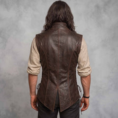 Rear studio shot of man wearing distressed brown leather medieval vest demonstrating tailored back lines and flared peplum skirt