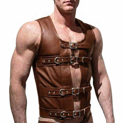 Front view of a shirtless athletic man wearing a brown top-grain leather corset vest featuring four lockable buckle straps and side D-rings.