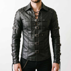 Front view of male model wearing handmade gothic black cowhide leather shirt with chest cord lacing, fold down collar, and five horizontal roller buckles