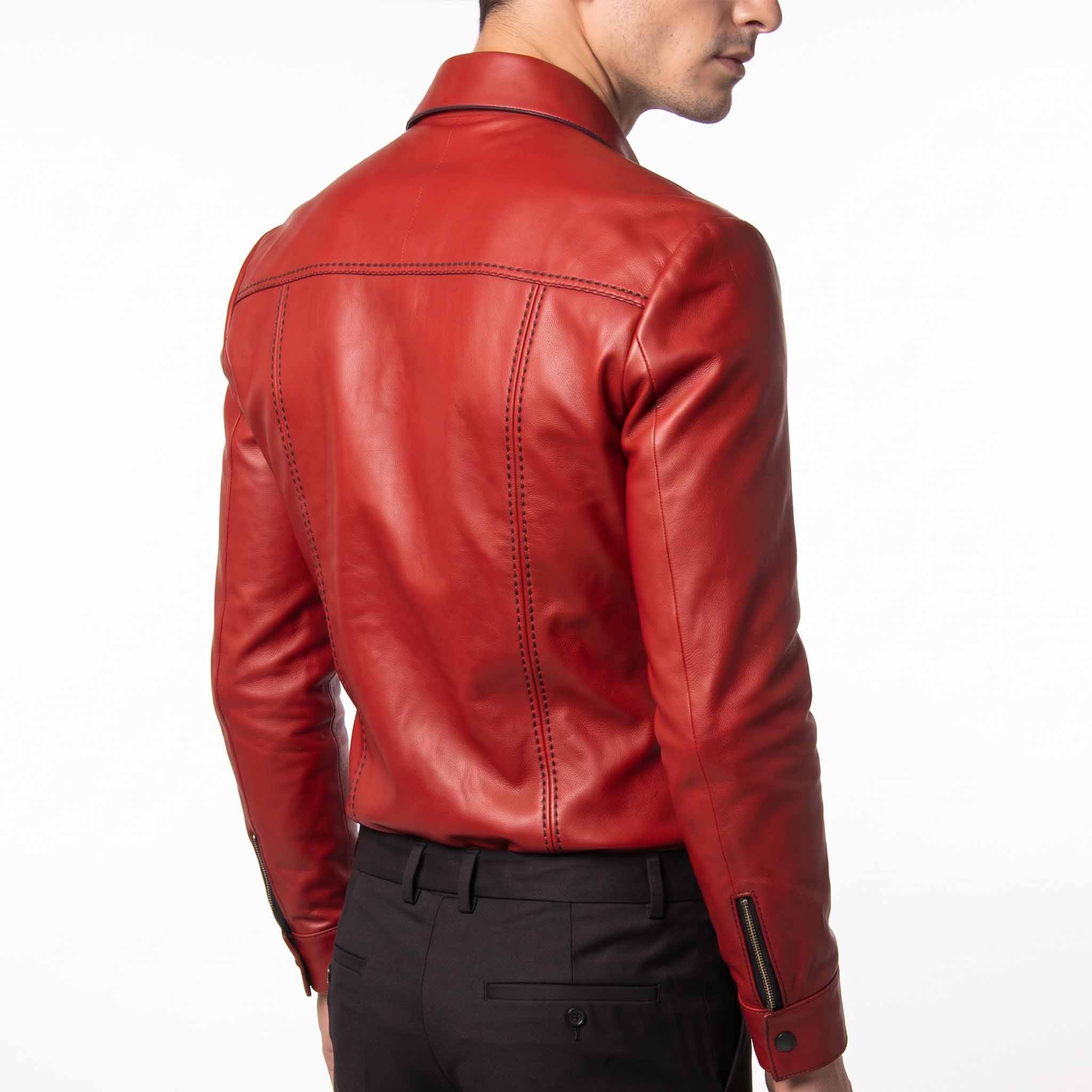 Three quarter back view of man wearing red slim fit cowhide leather shirt highlighting vertical contour stitching and collar shape