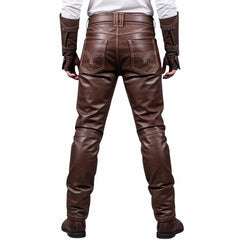 Rear view showing back pockets, reinforced stitching, and belt loop structure on men's brown leather LARP trousers against a white background.