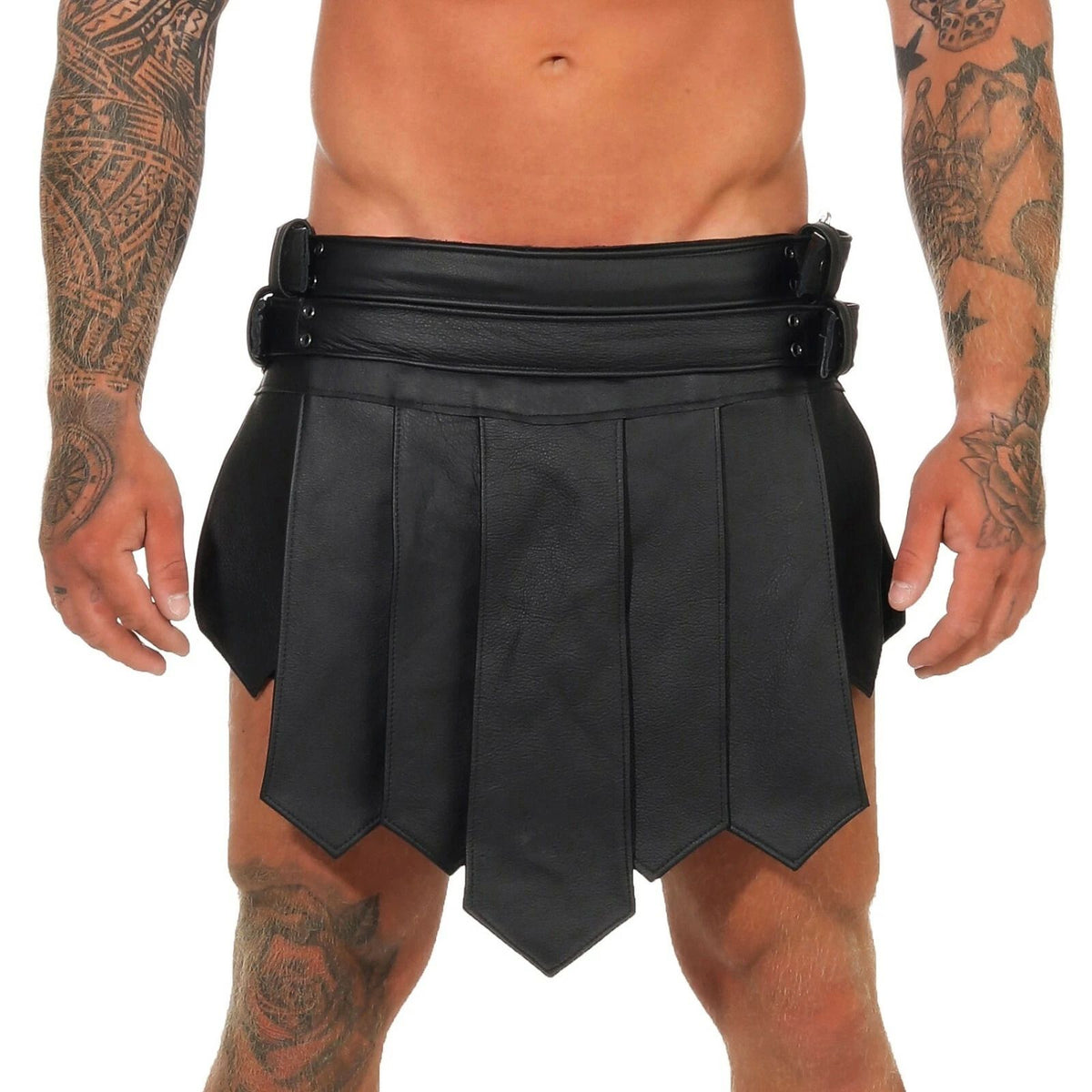 A black leather kilt costume worn by a model, featuring a wide adjustable waistband with metal buckles and a pleated, tiered skirt design, shown against a plain white background.