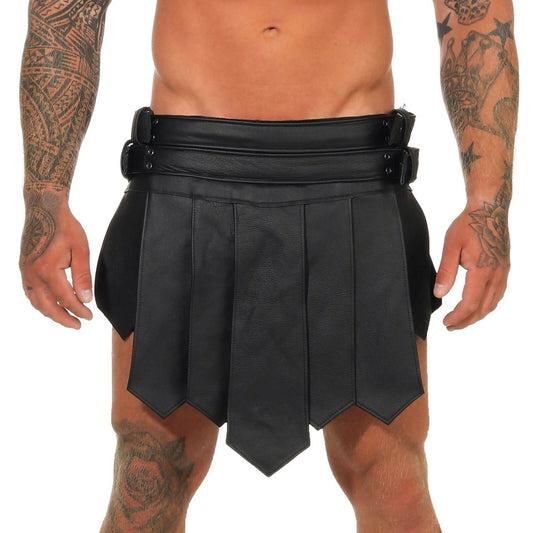 A black leather kilt costume worn by a model, featuring a wide adjustable waistband with metal buckles and a pleated, tiered skirt design, shown against a plain white background.