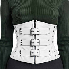 Front view of a white leather underbust corset featuring three silver roller buckles over a central metal zipper.
