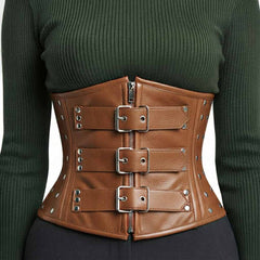 Front view of a brown leather underbust corset with triple roller buckle straps for steampunk styling.