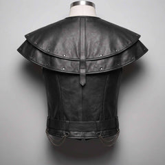 Rear view of a tailored black leather gothic warrior jerkin showing the layered riveted back capelet, vertical harness strap, and hanging side chains.