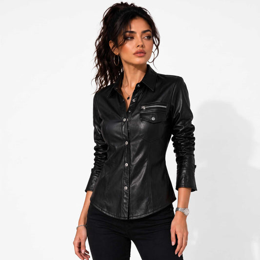 Front view of a brunette model posing in a slim fit black genuine sheep leather shirt with a zip chest pocket and snap button placket.