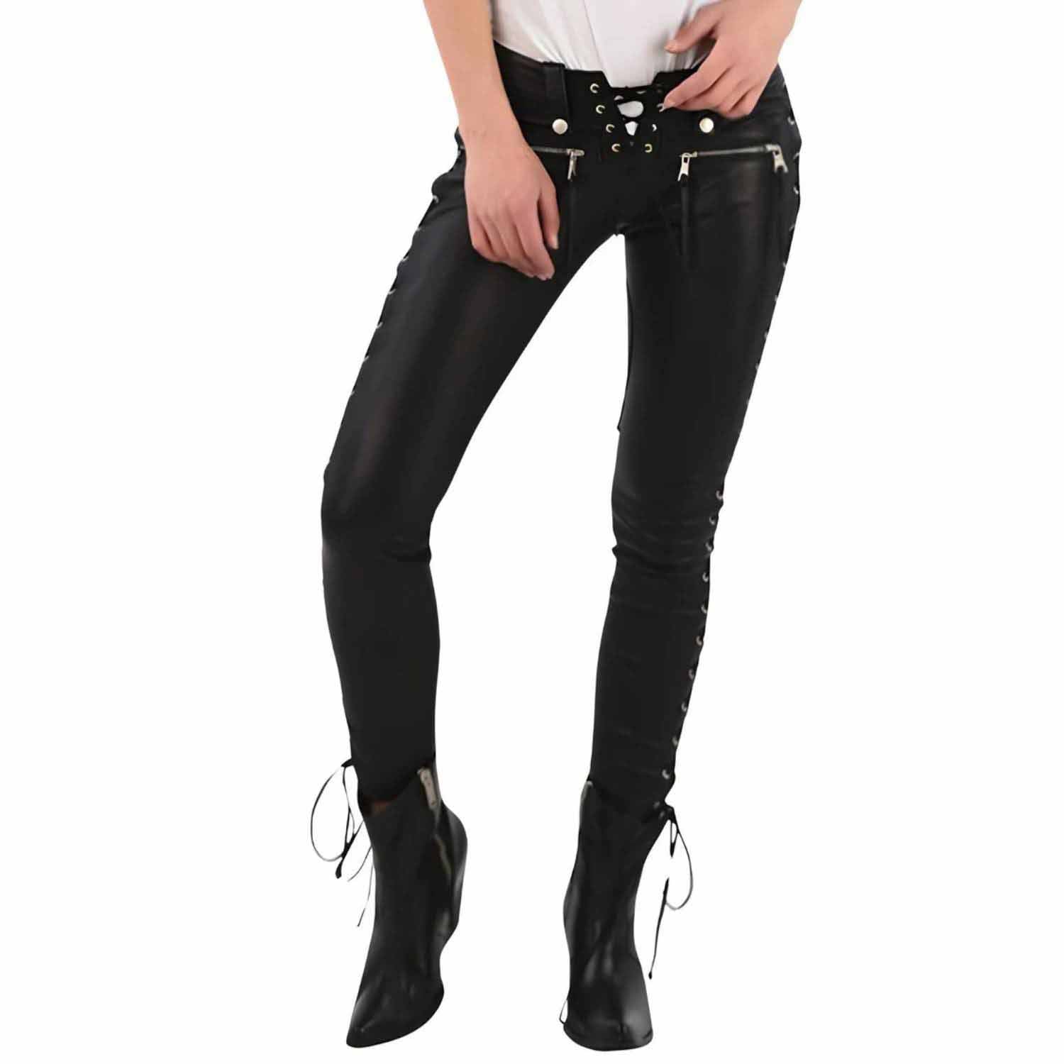 Direct front view of female model in low rise black leather pants showing front lace up fly, snap buttons, and horizontal hip zippers