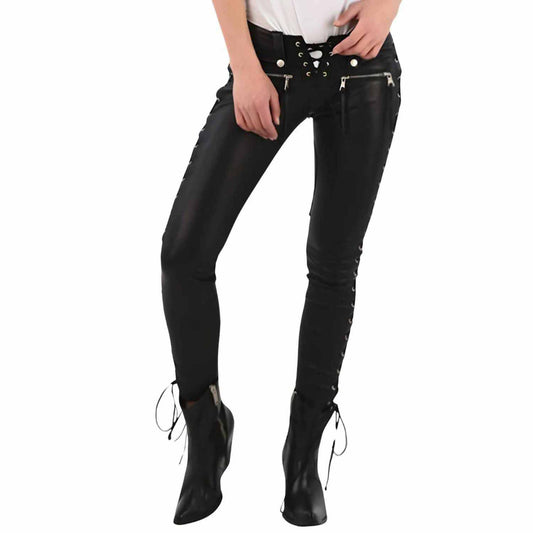 Direct front view of female model in low rise black leather pants showing front lace up fly, snap buttons, and horizontal hip zippers