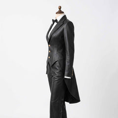 Side profile angle of tailored black leather tailcoat suit detailing peaked lapels, sleeve cuff buttons, and elegant back tail drape