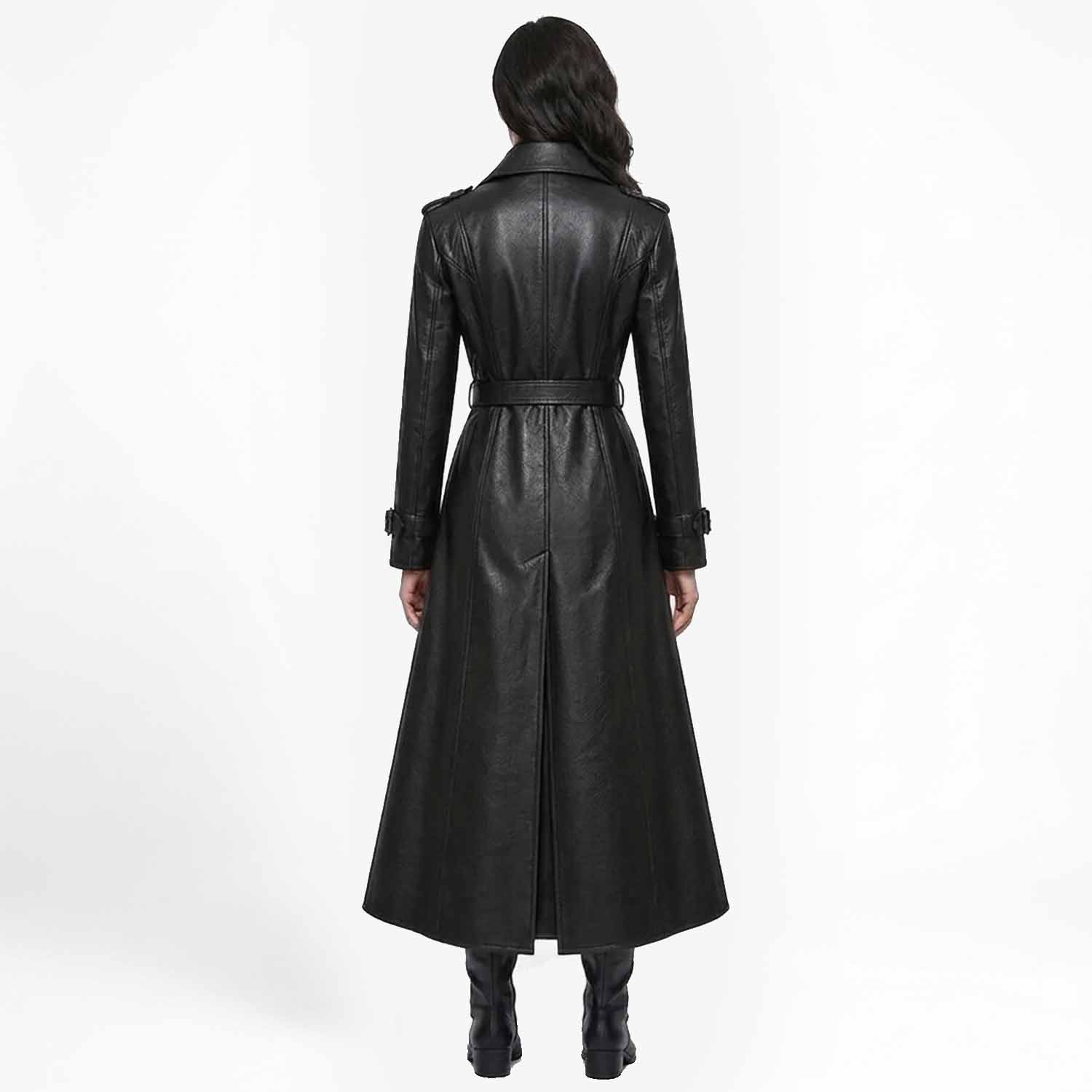 Back view of a woman in a longline black leather duster jacket showcasing the structured paneled seams and rear hem split.