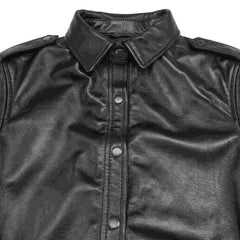Detailed flat lay of the classic point collar, military shoulder epaulets, and snap button placket of a black leather shirt.