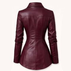 Back view showing the angled Western back yoke and sculpted hourglass princess seams of a women's burgundy wine leather blouse.