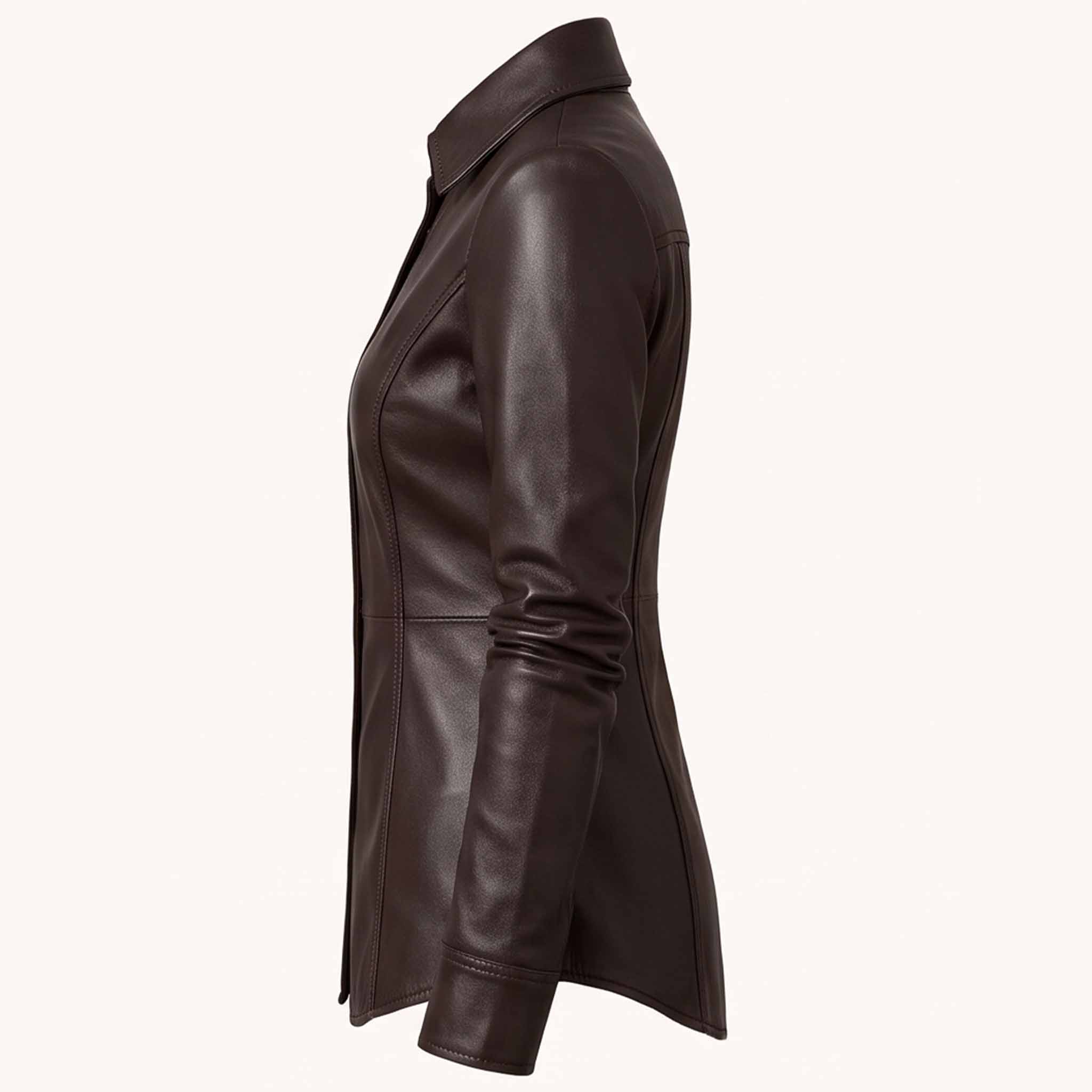 Side profile view showcasing the sleek torso tailoring, long sleeves, and curved bottom edge of a women's dark brown leather overshirt.