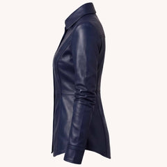 Direct side profile view showcasing the sleek torso contour, long sleeves, and curved shirt hem of a handcrafted navy leather blouse.