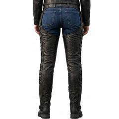 Back view of model wearing women's real leather motorcycle riding chaps highlighting waist belt and full-length outer leg eyelet laces