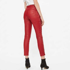 Back angle view of women's red real leather skinny trousers showing rear patch pockets