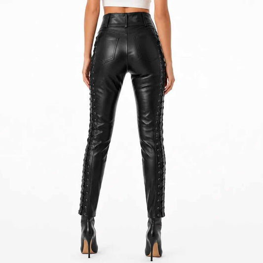 Back view of a woman wearing black genuine leather lace up skinny pants showing side lacing details