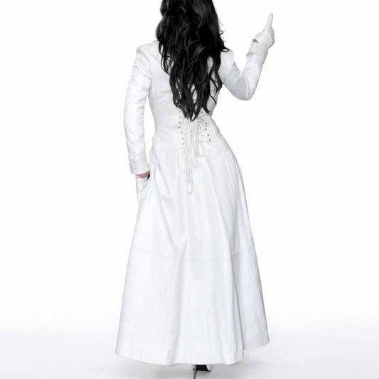 Back profile of a long white Nappa leather trench coat showing the adjustable lace-up corset back detail and flared skirt.