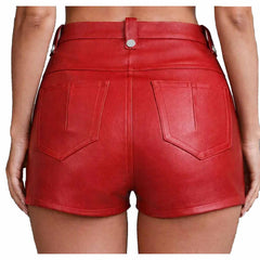 Back view of a woman wearing red leather high waisted shorts showing classic back patch pockets and belt loops.