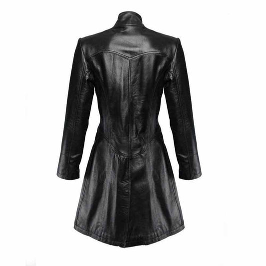Back profile of a women's black lambskin leather coat displaying tailored panel seams, a cinched waist structure, and a rear bottom vent.